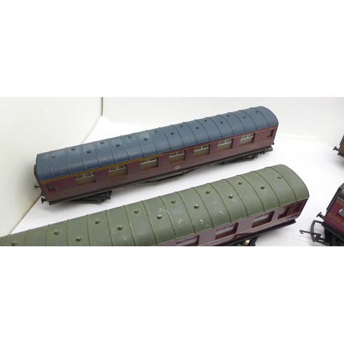 672 - Four Hornby OO gauge maroon coaches