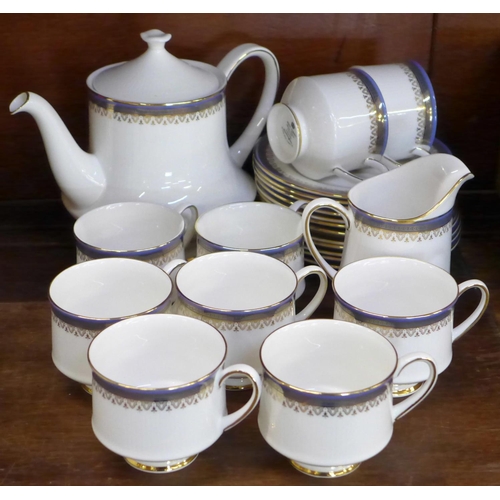 684 - Royal Albert Sandringham teawares comprising twelve side plates, nine cups, a teapot and milk jug