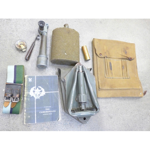 696 - Assorted military items; trench spade, periscope, belt, canvas pouch, etc.