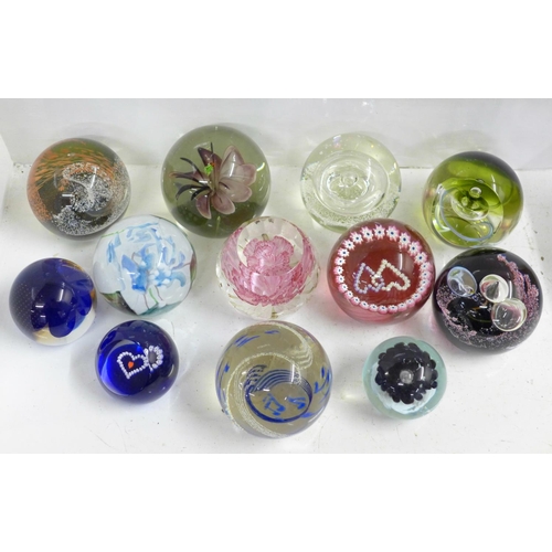 708 - Twelve glass paperweights including Caithness, five with certificates