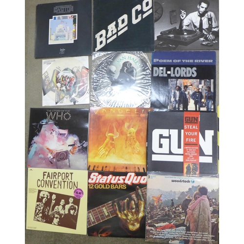 713 - A collection of twelve LP records, Led Zeppelin, Woodstock, Bad Co, Donald Fagen, etc.