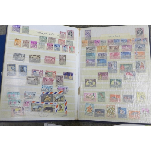 714 - Stamps; first day covers, Malaya and worldwide (two albums and envelope)