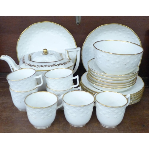 719 - A set of 1820's porcelain including five trios and spare cups, a teapot, side plates, bowls, etc. (f... 