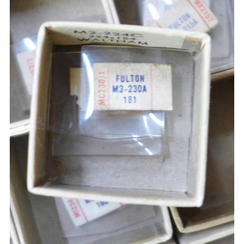 731 - A box of Waltham wristwatch crystals