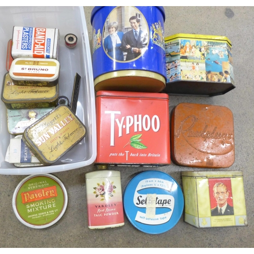 739 - Two boxes of advertising tins and a small Nikon shop display metal plaque