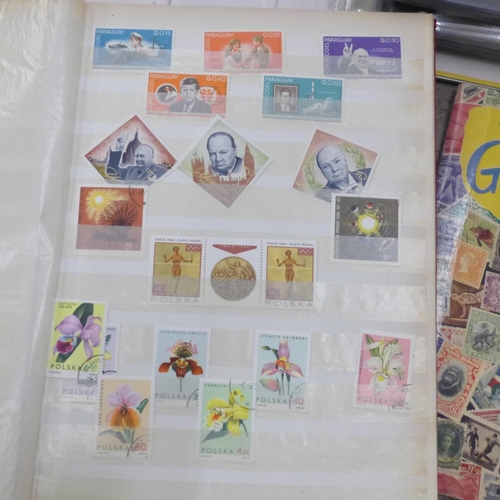 753 - Four albums of stamps, postal history, Stanley Gibbons catalogue and other postal ephemera