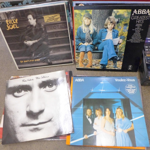 754 - A case of LP records, Elvis Costello, Police, David Bowie, Meatloaf, Dire Straits, etc., and a box o... 