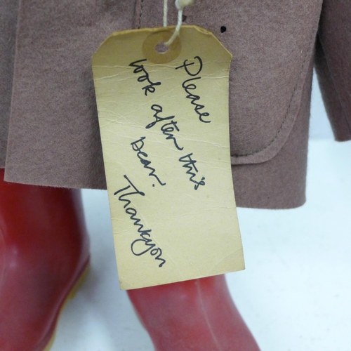 772 - A Gabrielle Designs Paddington Bear figure with red Dunlop Wellington boots, clothing with moth dama... 