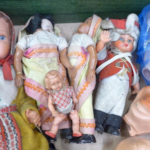 789 - A collection of costume and other early plastic dolls