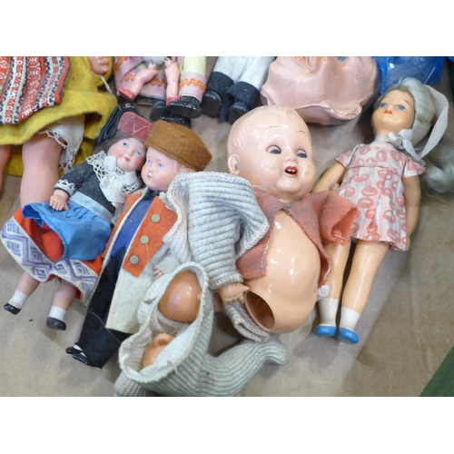 789 - A collection of costume and other early plastic dolls