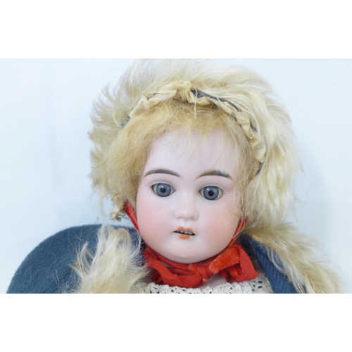 801 - A German Armand Marseille bisque head doll with blue sleep eyes, 3200 AM2 DEP identification mark, s... 