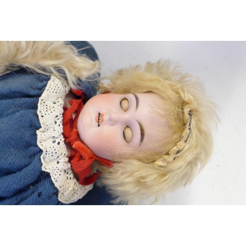 801 - A German Armand Marseille bisque head doll with blue sleep eyes, 3200 AM2 DEP identification mark, s... 