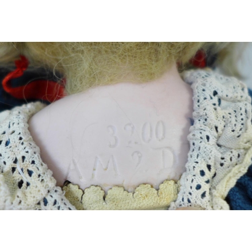 801 - A German Armand Marseille bisque head doll with blue sleep eyes, 3200 AM2 DEP identification mark, s... 