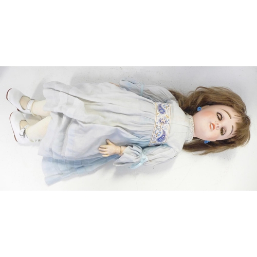 802 - A French Limoges bisque head doll with deep violet sleep eyes, Limoges 9 identification mark, right ... 