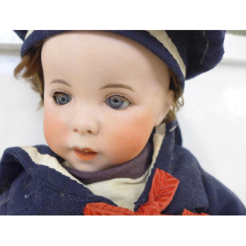 803 - A French S.F.B.J. bisque head doll with blue open eyes, 247 identification number (known in U.S.A. a... 