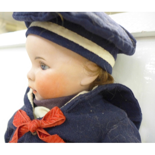 803 - A French S.F.B.J. bisque head doll with blue open eyes, 247 identification number (known in U.S.A. a... 