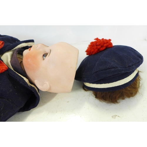 803 - A French S.F.B.J. bisque head doll with blue open eyes, 247 identification number (known in U.S.A. a... 