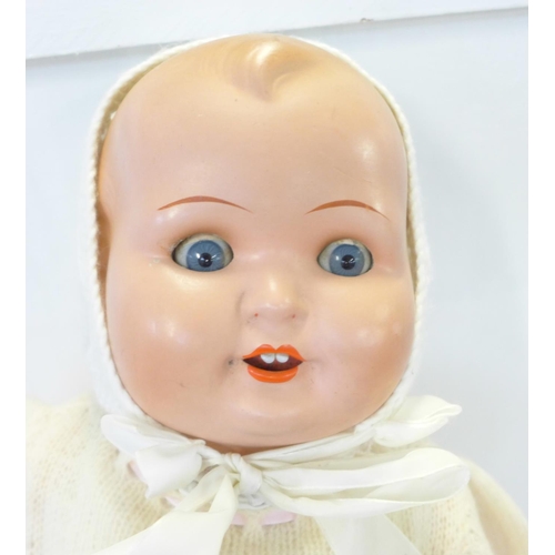 804 - A German Handwerk composition doll with blue sleep eyes, Bonnie Babe model, circa 1920's/1930's, 50c... 