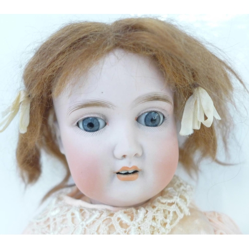 805 - A German Gerbruder Krauss bisque head doll with blue sleep eyes, 265 Gbn 165 k 212 identification ma... 