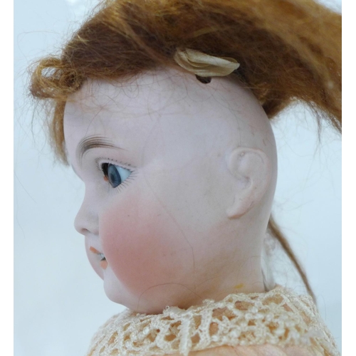 805 - A German Gerbruder Krauss bisque head doll with blue sleep eyes, 265 Gbn 165 k 212 identification ma... 