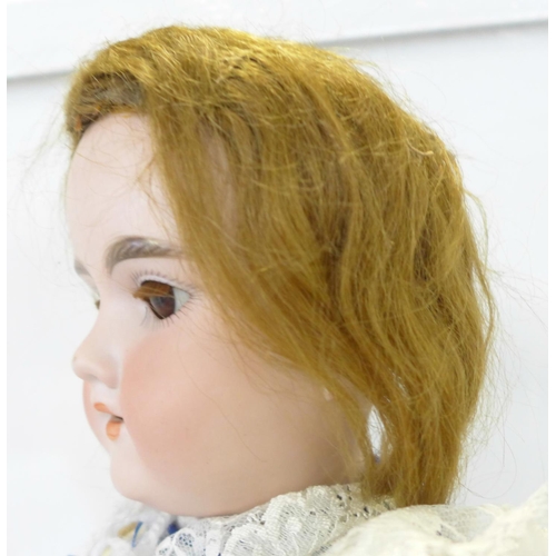 806 - A German Armand Marseille bisque head doll, fixed brown eyes, 390 A5M identification mark, c1915-192... 