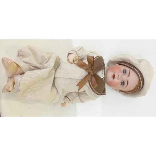 811 - A German Franz Schmidt Simon & Halbig doll with blue sleep eyes, 55 identification mark, circa 1890-... 