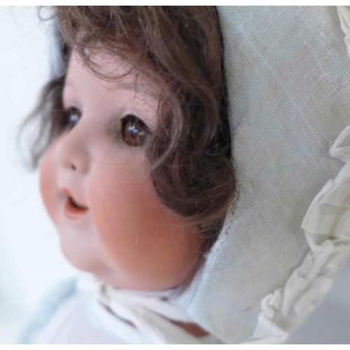 815 - A German Armand Marseille bisque head doll with brown sleep eyes, 996 A3M identification mark, circa... 