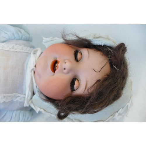 815 - A German Armand Marseille bisque head doll with brown sleep eyes, 996 A3M identification mark, circa... 