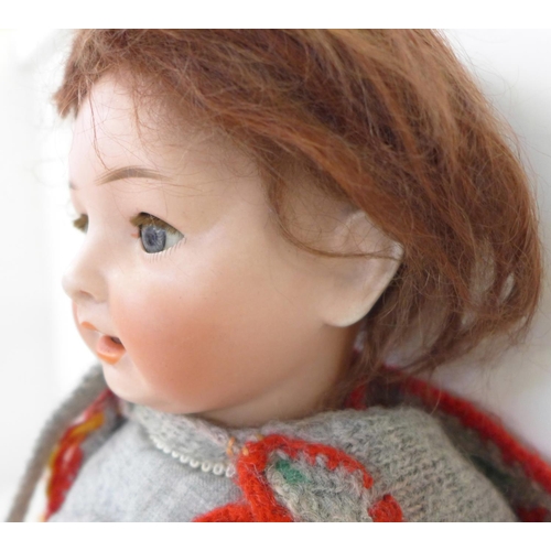 826 - A German Gebruder Ohihauer-Revalo bisque head doll with blue sleep eyes, Revelo 22-10 identification... 