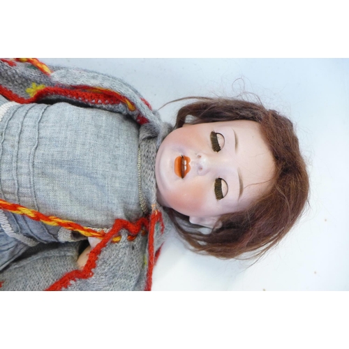 826 - A German Gebruder Ohihauer-Revalo bisque head doll with blue sleep eyes, Revelo 22-10 identification... 