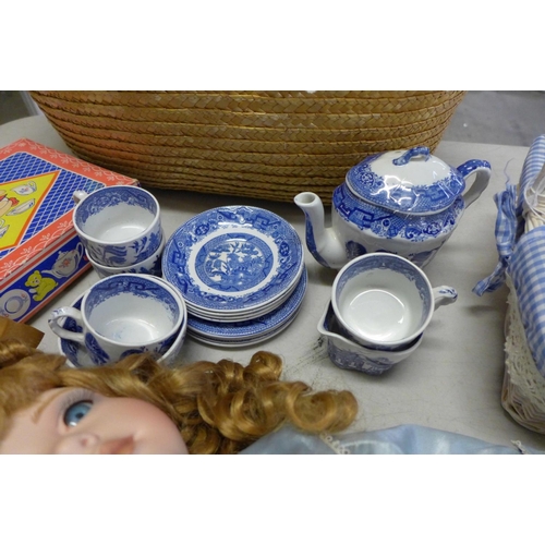 833 - A boxed Royal Doulton collectors doll, an Alberon doll, three dolls tea sets and two small wooden ar... 