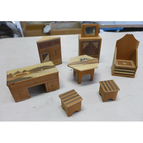 834 - A collection of 1930's dolls house furniture with inlaid decoration, some with Japanese landscape sc... 