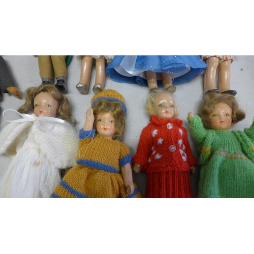 836 - Eight Rosebud composition dolls, circa 1930's-1940's and a wooden doll