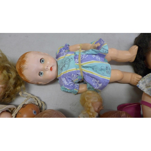 838 - A box of vintage dolls, three dressed baby BND dolls, a large and a small Pedigree doll and a Palito... 