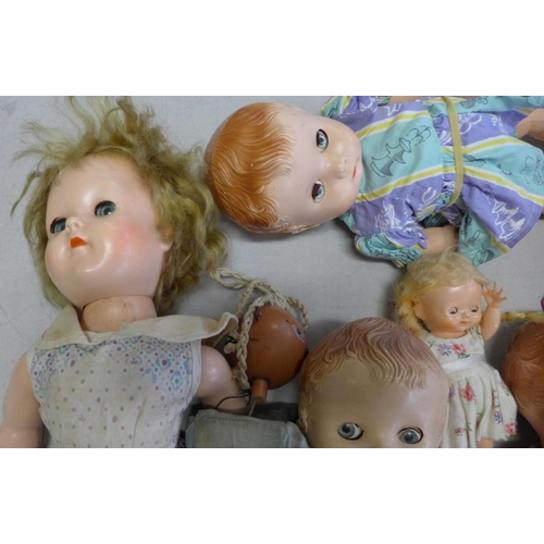 838 - A box of vintage dolls, three dressed baby BND dolls, a large and a small Pedigree doll and a Palito... 