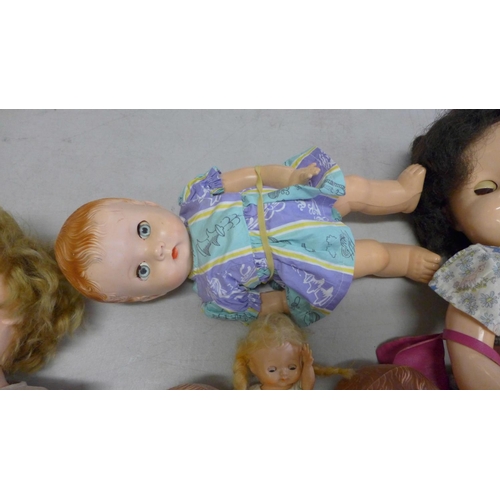 838 - A box of vintage dolls, three dressed baby BND dolls, a large and a small Pedigree doll and a Palito... 