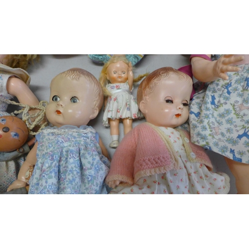 838 - A box of vintage dolls, three dressed baby BND dolls, a large and a small Pedigree doll and a Palito... 