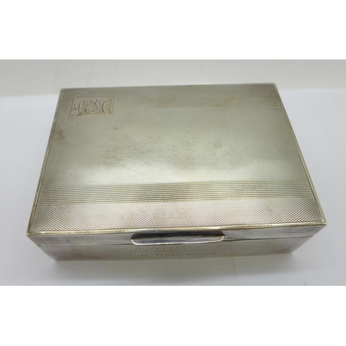 891 - A silver cigarette box, with inscription, width 12.5cm