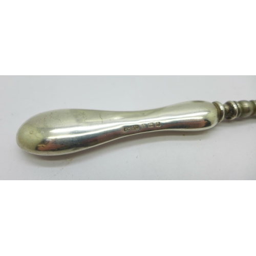 892 - A silver mounted scent atomiser, a silver handled boot hook and a silver Charles Horner thimble