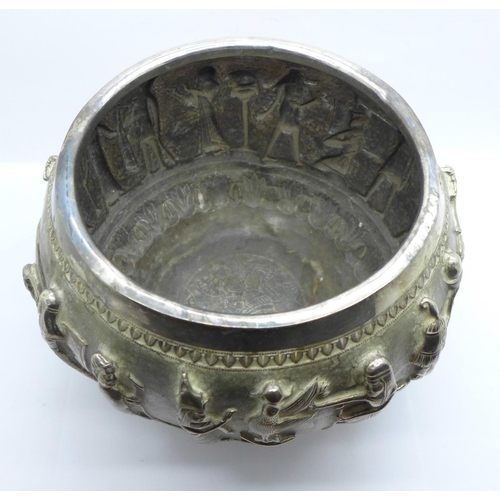 892A - An Egyptian embossed bowl with Pharoahs and mythological creatures, height 14cm