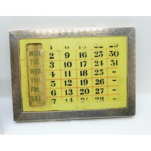 902 - A Tiffany silver calendar and one other silver calendar lacking back stand