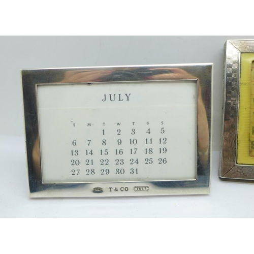 902 - A Tiffany silver calendar and one other silver calendar lacking back stand