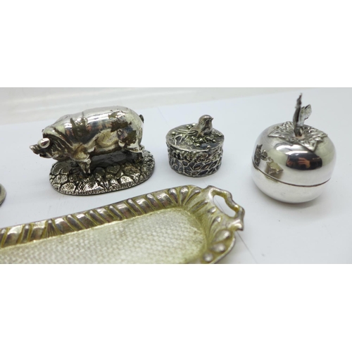 922 - A silver covered pig, a/f, a bird, two pots and a miniature doll's house tea service