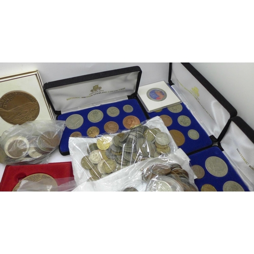 949 - A large collection of British and foreign coins, commemorative sets including 1976 Olympics, medalli... 