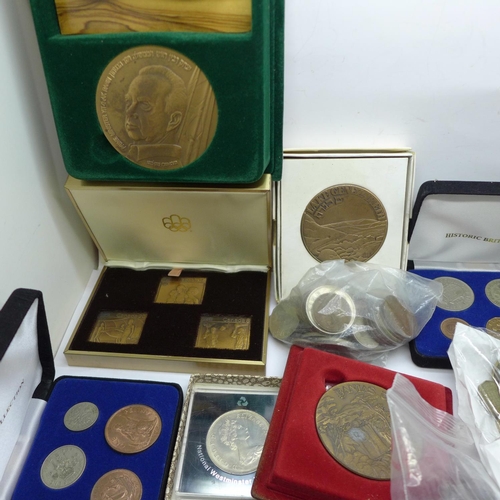 949 - A large collection of British and foreign coins, commemorative sets including 1976 Olympics, medalli... 