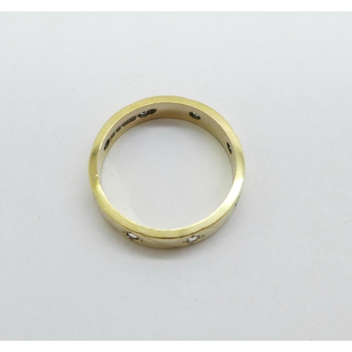 961 - A 9ct gold eternity ring, 2.8g, L