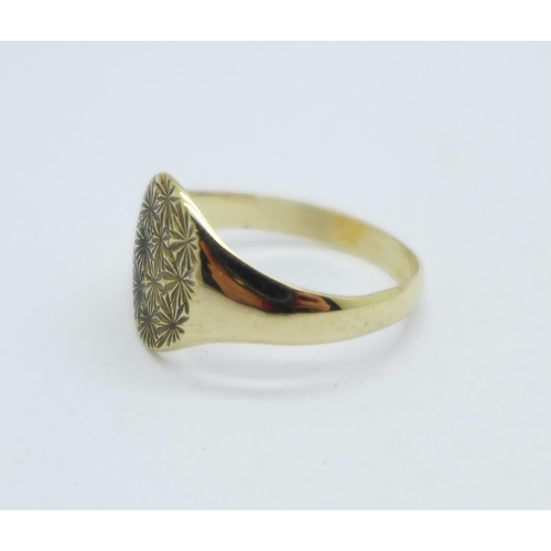 963 - A 9ct gold signet ring, 2.2g, M