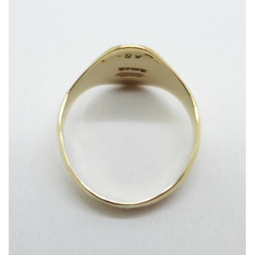 963 - A 9ct gold signet ring, 2.2g, M