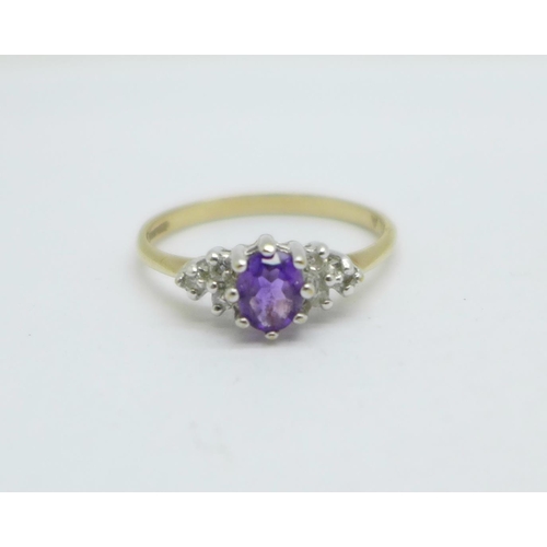 970 - A 9ct gold, amethyst set ring with diamond shoulders, 1.6g, N