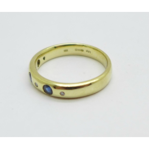 973 - A 14ct gold, sapphire and diamond ring, 4.4g, P